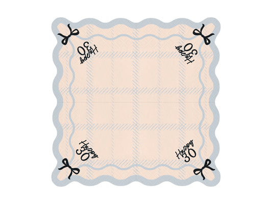 Flat lay of Happy 30 scalloped napkin with pastel plaid pattern and bow detail, ideal for 30th birthday parties in Toronto