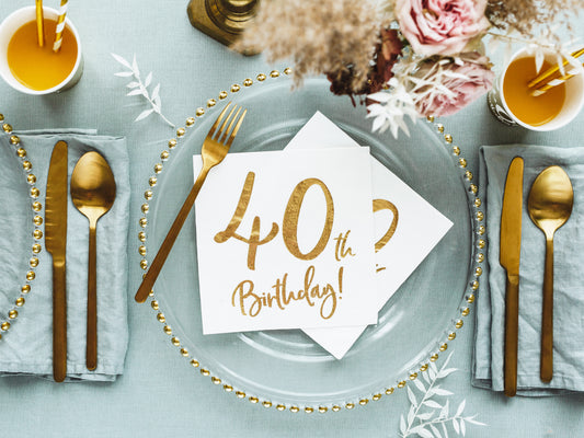 White and gold 40th birthday napkins for milestone celebrations, shipping across Canada.