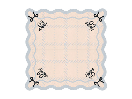 Flat lay of Happy 60 scalloped napkin with pastel plaid pattern and bow detail, ideal for 60th birthday parties.