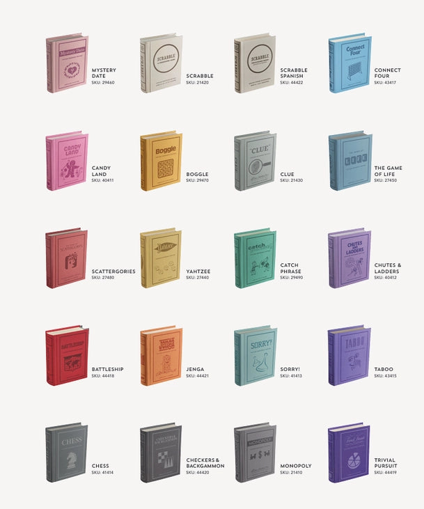 Collection of vintage bookshelf edition board game boxes with titles and colours. Sold in Toronto at Confetti My Party.