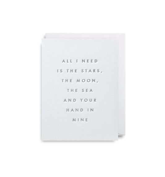 mini greeting card with "all i need is the stars, the moon, the sea and your hand in mine"