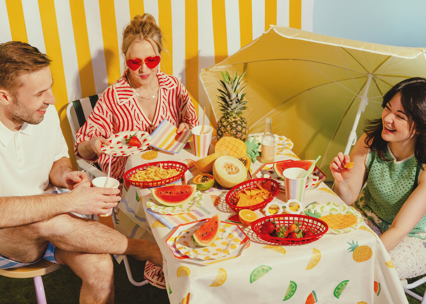 Striped paper party plates with a retro summer design available in Toronto and shipping across Canada