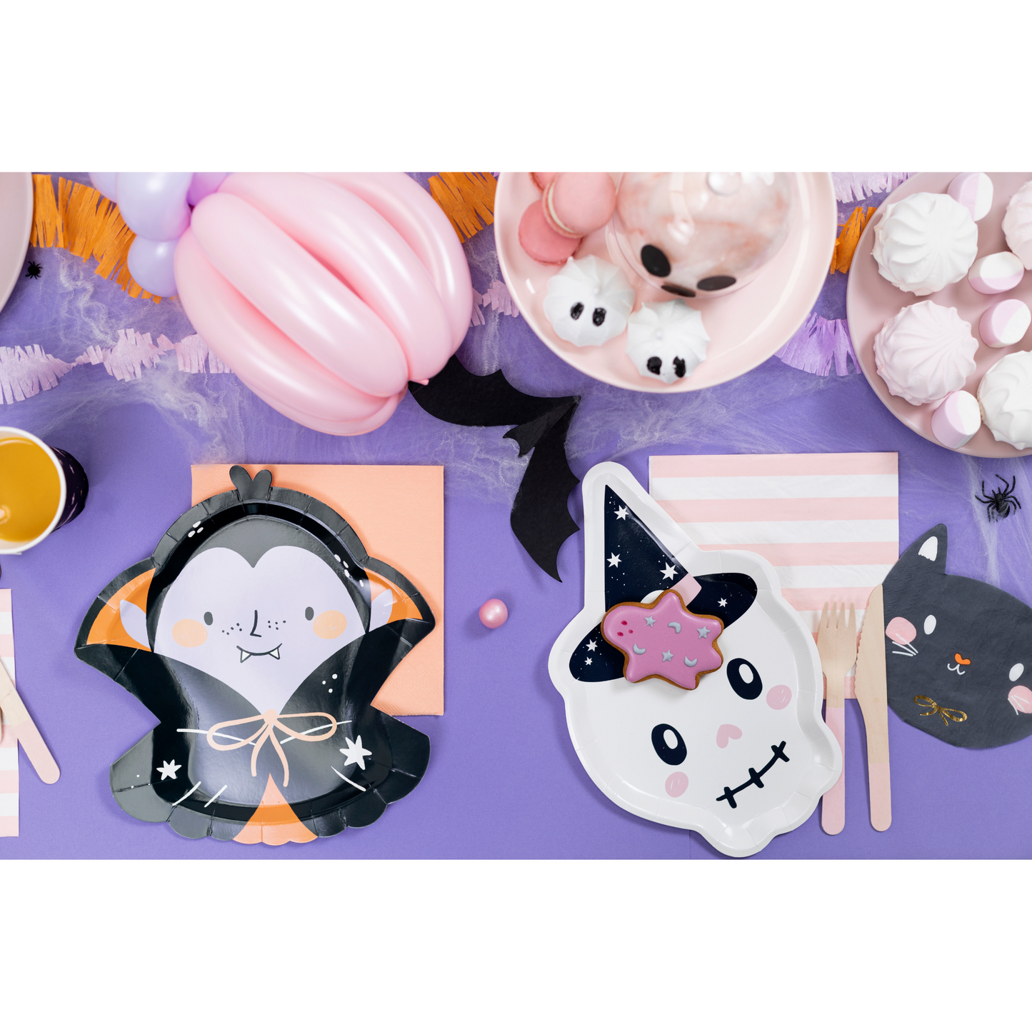 dracula and skull shaped paper plates with cat and spider napkins