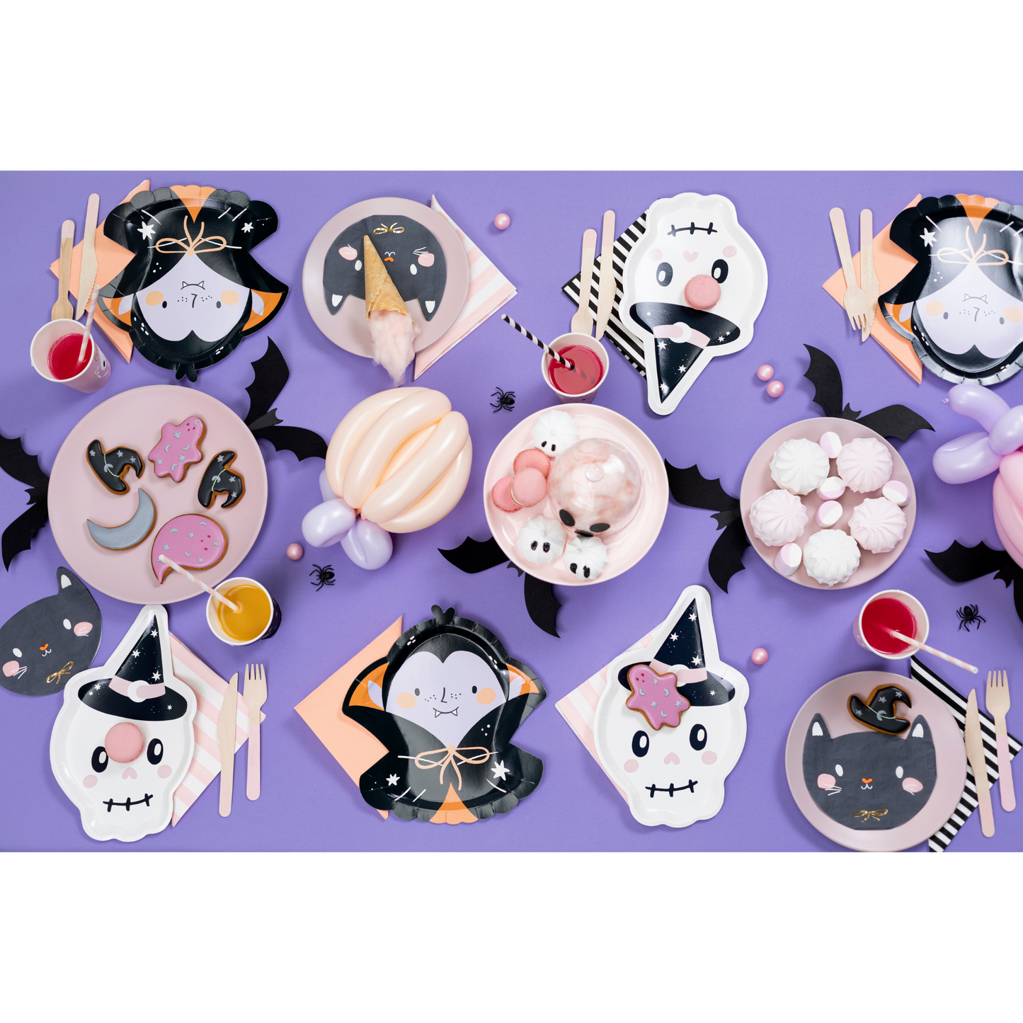 dracula and skull paper plates with other halloween decor tablescape