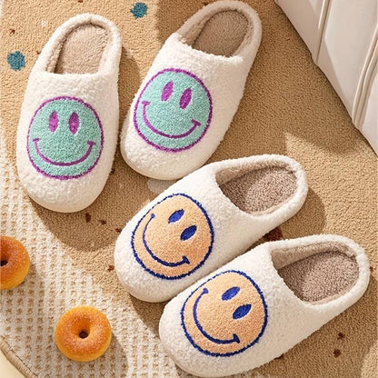 fuzzy smiley face slippers blue and orange