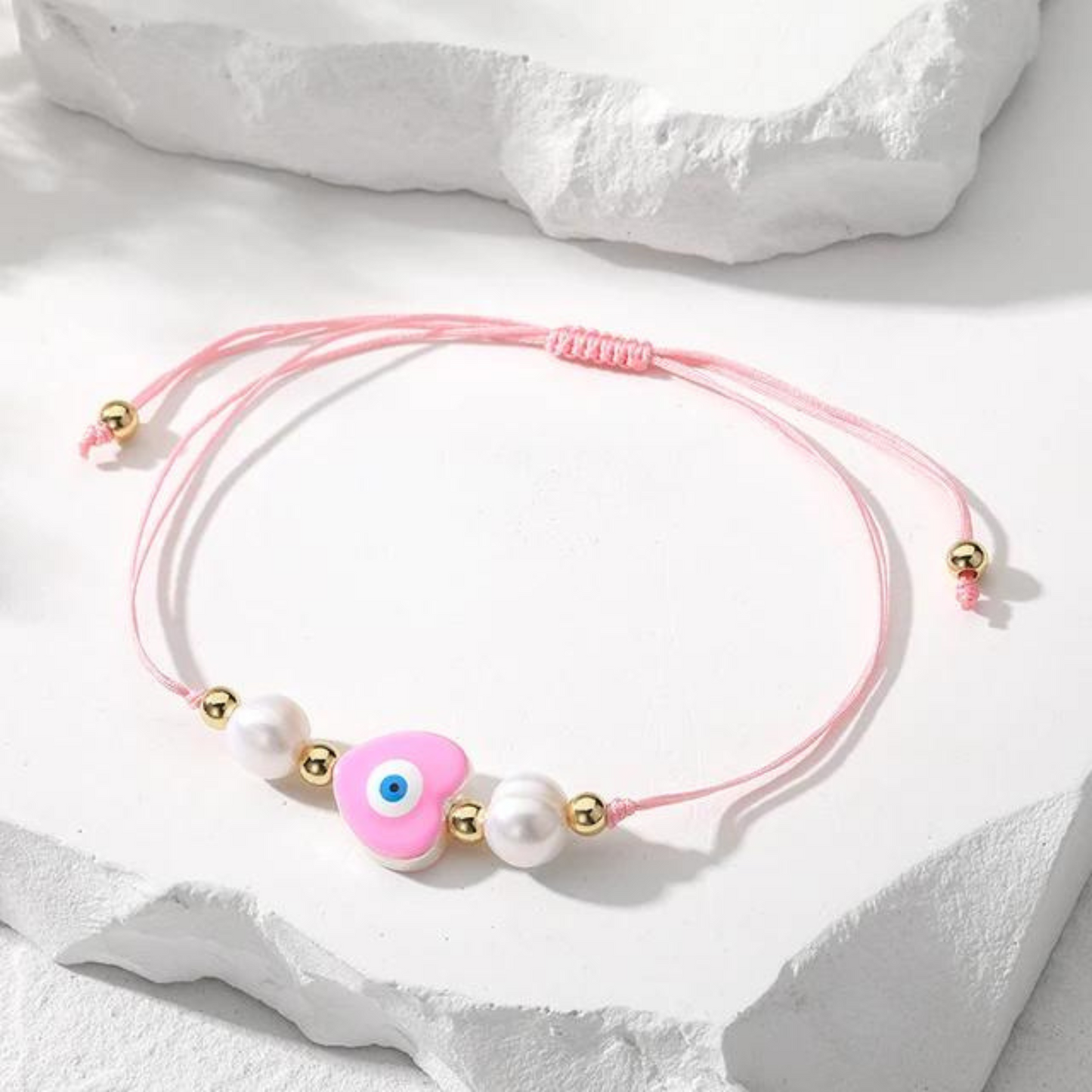 gold plated evil eye rope bracelet- pink