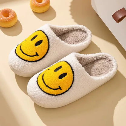 FUZZY HAPPY FACE SLIPPERS - BLACK + YELLOW