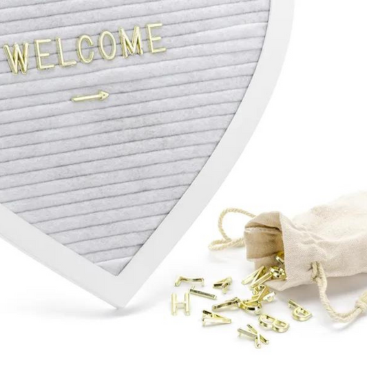 heart shaped letter board with gold letters