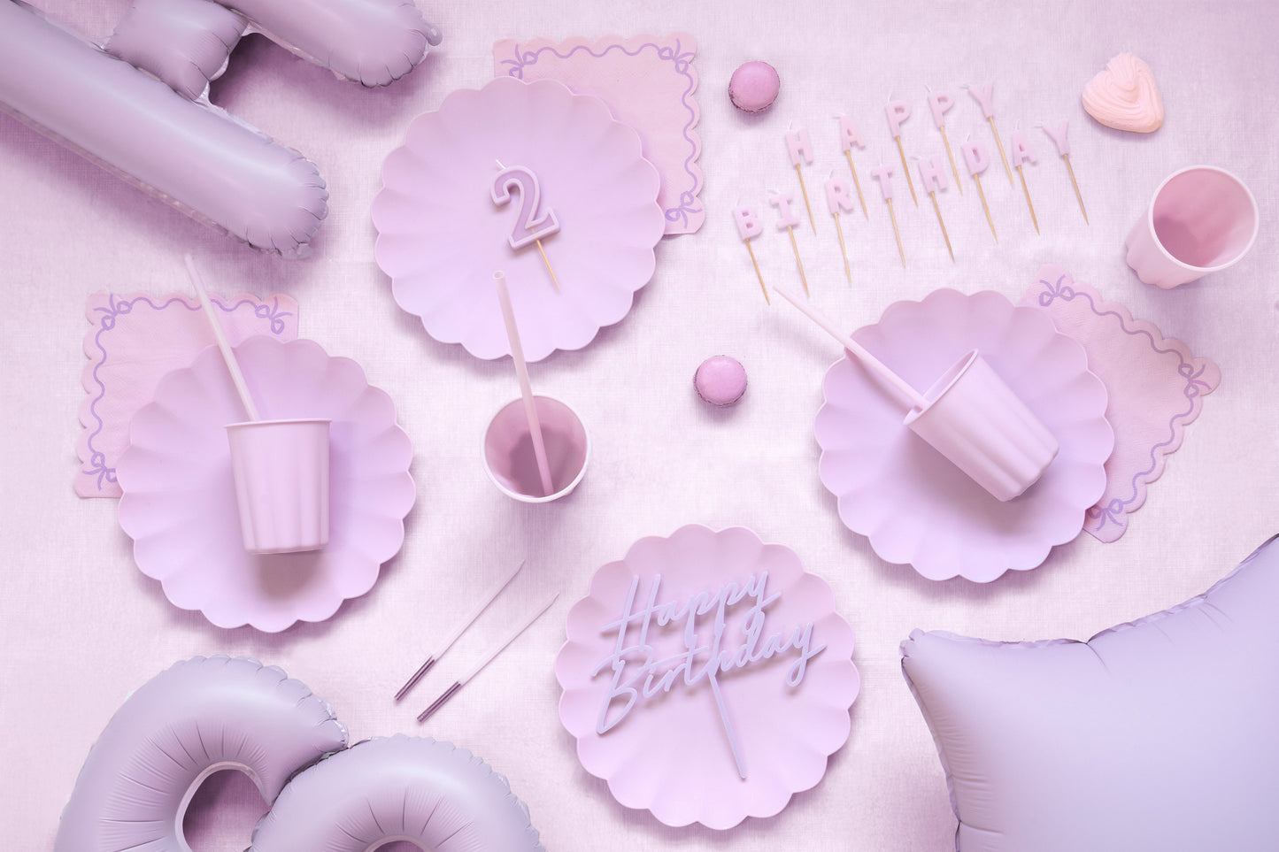 lilac scalloped edge plastic plates, cups, hbd banner and straws