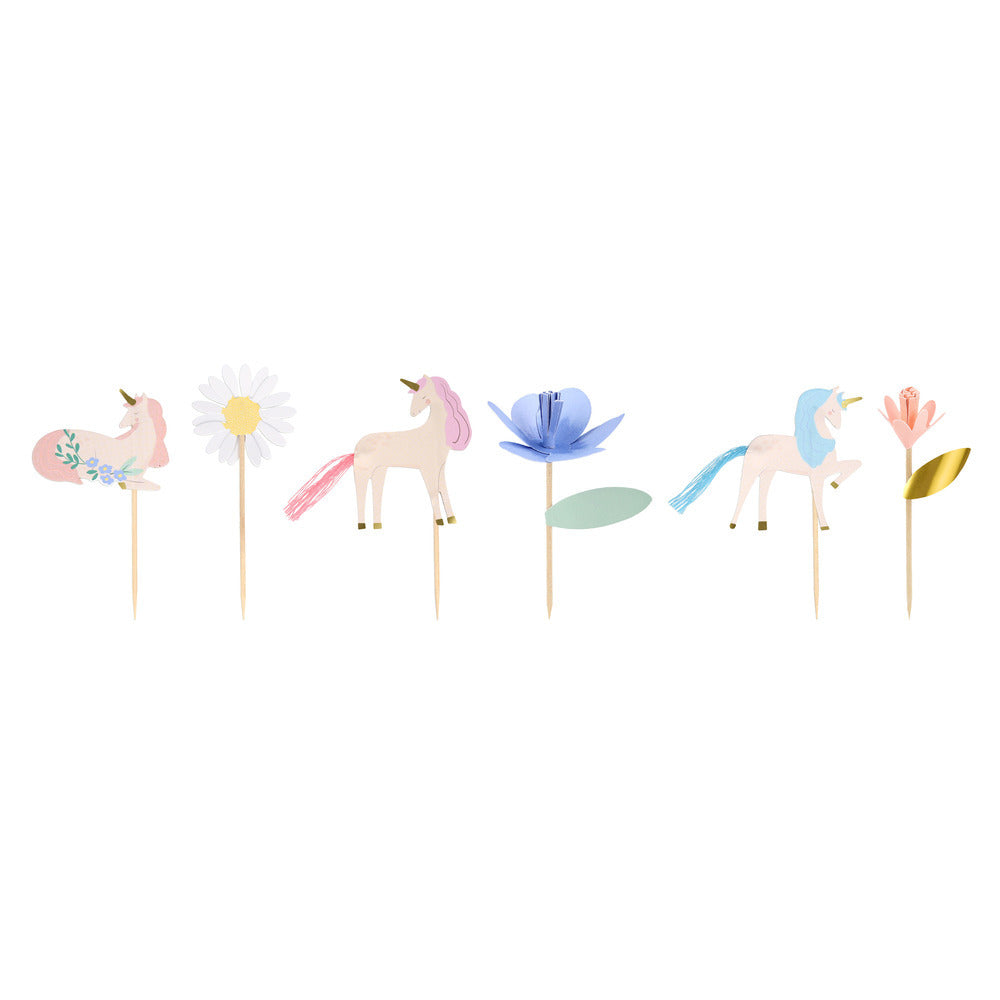 Pastel unicorn cupcake toppers from the Meri Meri Meadow Unicorn cupcake kit featuring floral and daisy details, available at our Toronto party shop.