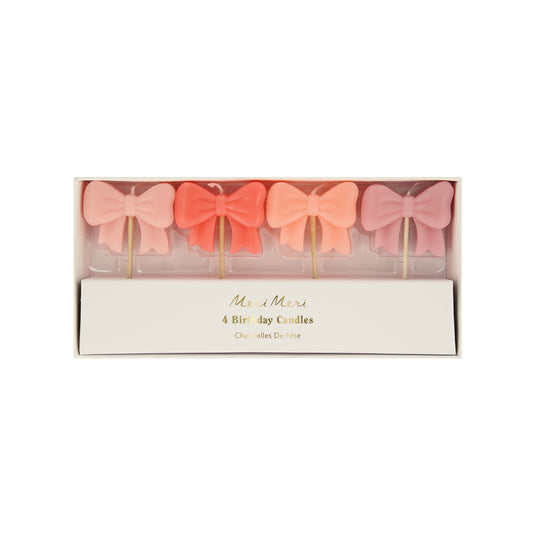 pink bow shaped candles - pack of 4 in shades of pink