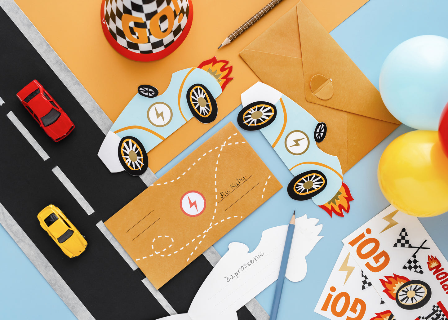 Race car-themed party stickers displayed with matching invitations, available in Toronto at Confetti My Party. Ships across Canada.