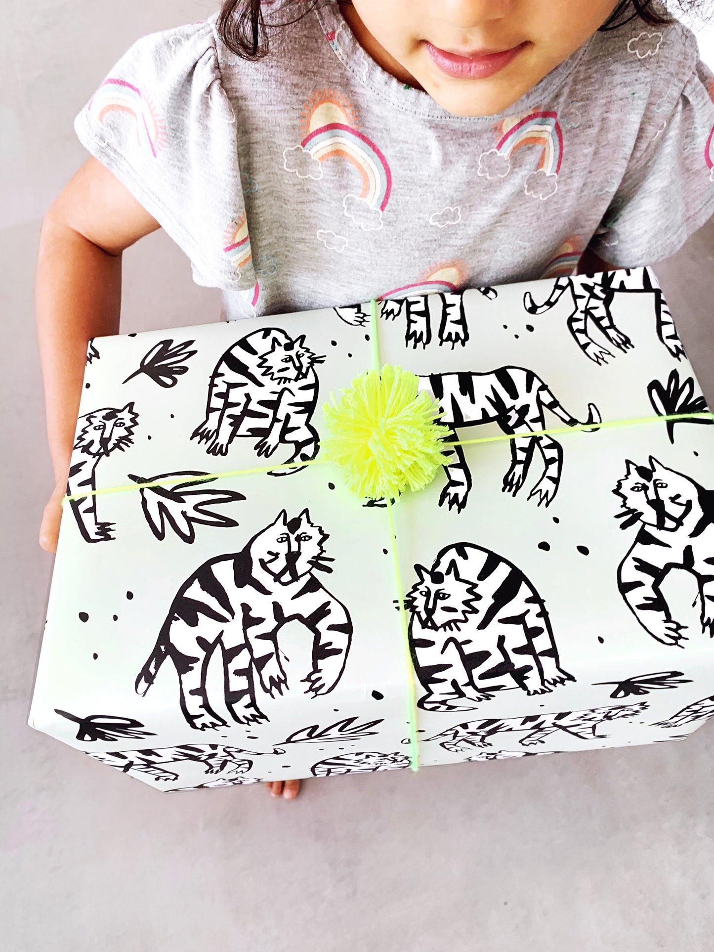 gift wrapped in mint wild cat's wrapping paper