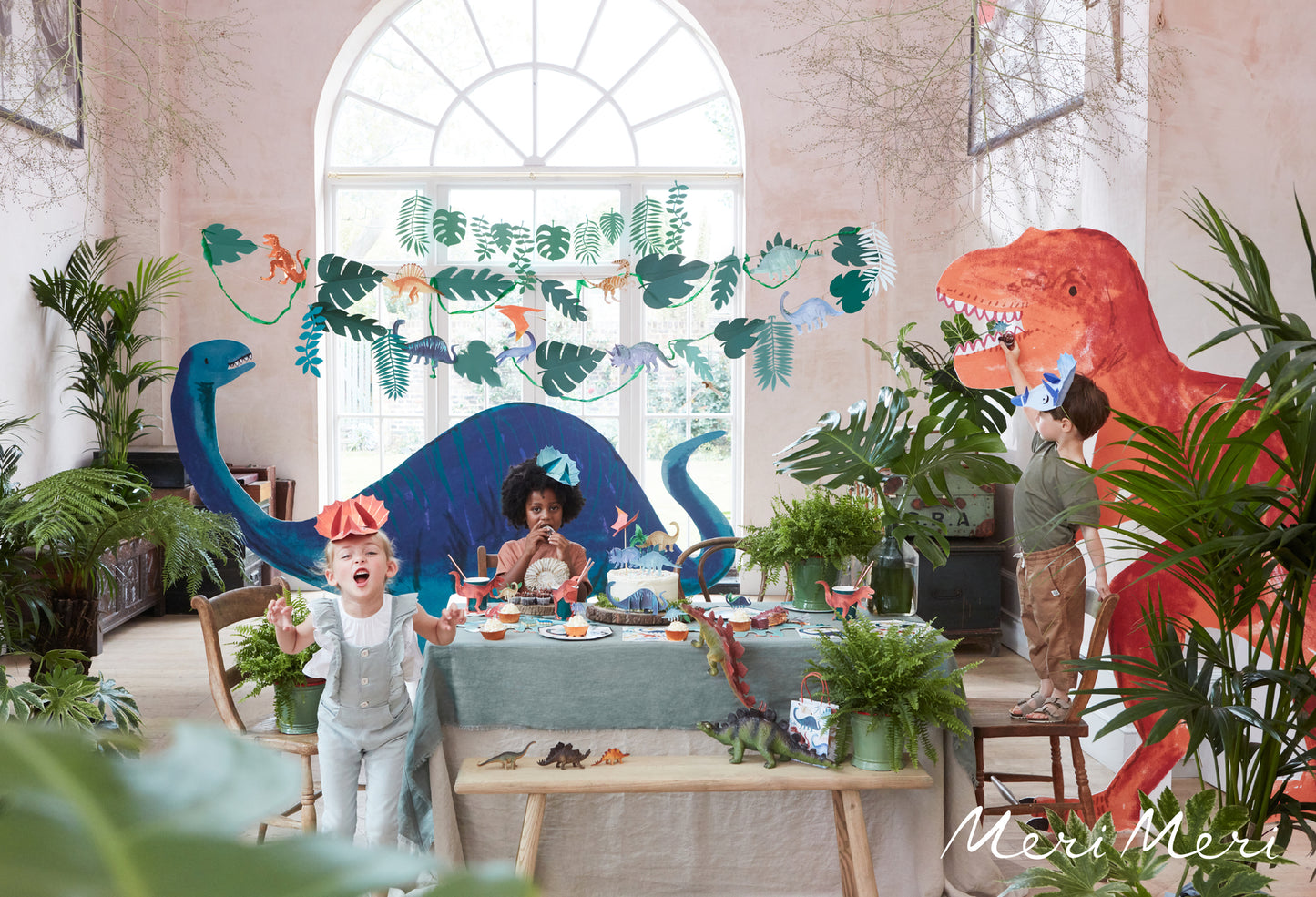 DINOSAUR KINGDOM PARTY HATS BY MERI MERI