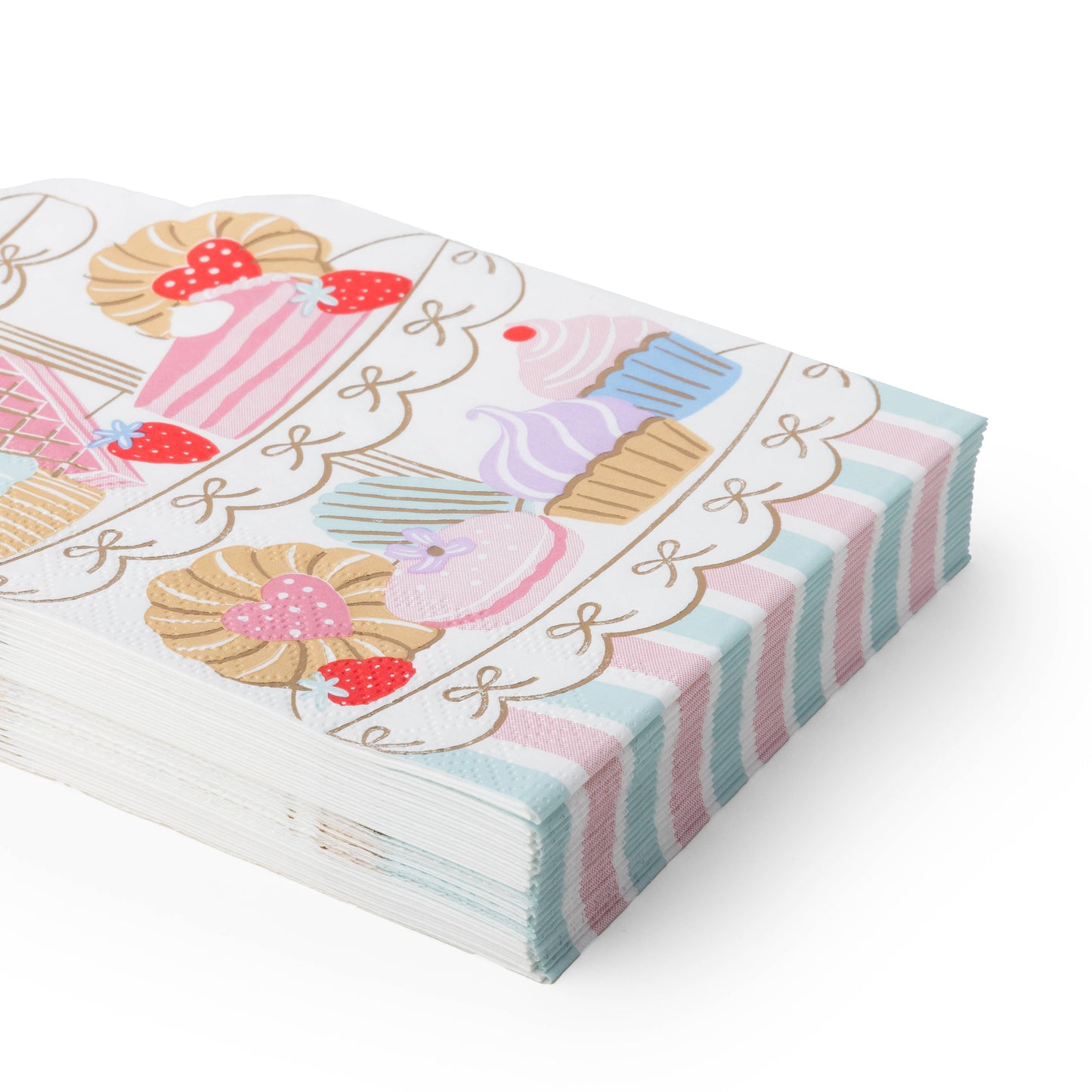 Close-up of high tea paper napkins with pastel pastries, strawberries, bows and gold foil details