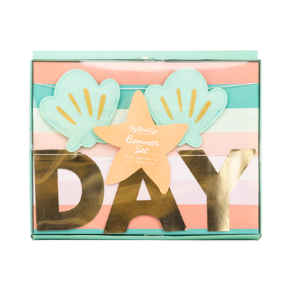 My Mind's Eye Mermaid Happy Birthday Banner Set packaging with mint felt seashells and gold foil lettering. Toronto pickup + Canada-wide shipping available.