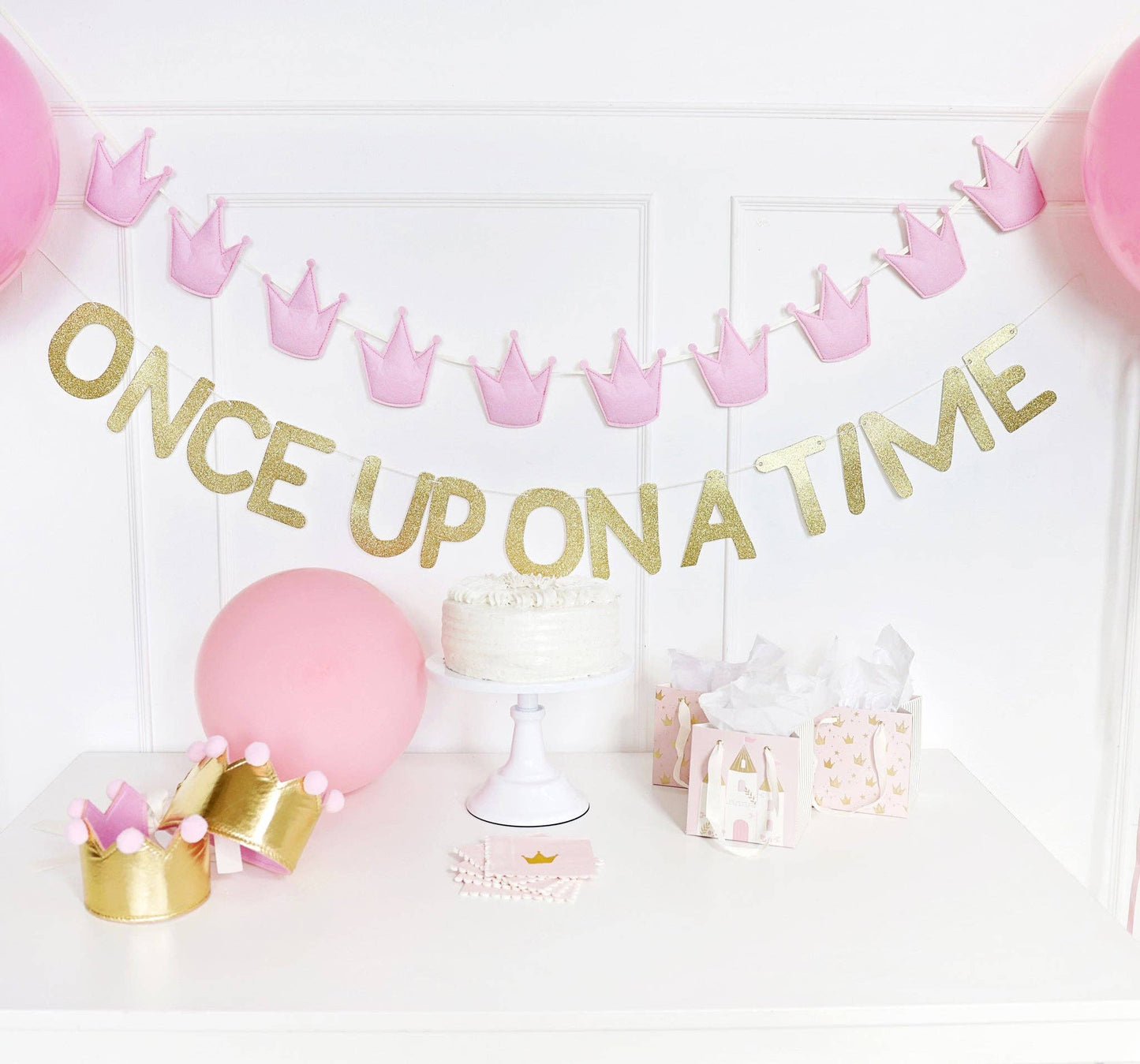 Once Upon A Time princess banner styled with pink balloons and party setup, available in Toronto and shipping across Canada