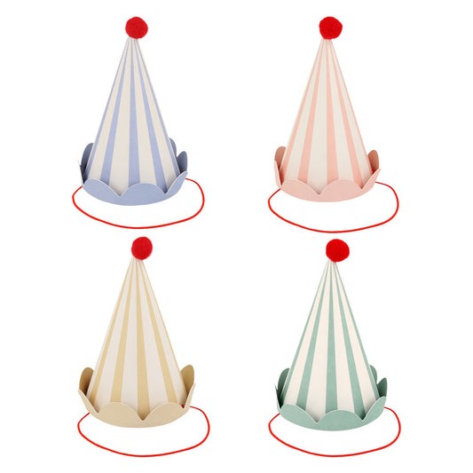 Animal Friends party hats by Meri Meri—striped pastel cones with red pom‑poms and scalloped edges, available in Toronto and shipping across Canada.