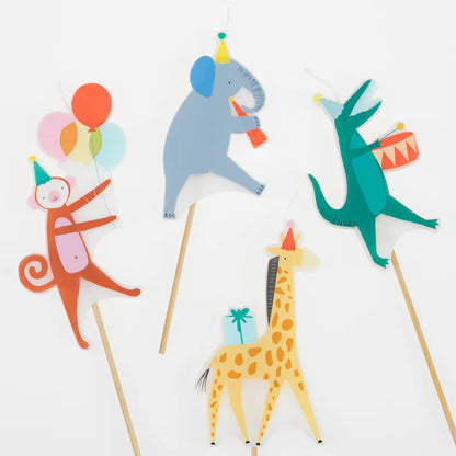lose‑up of Animal Parade candles by Meri Meri showing detailed safari animal designs and party hats, ideal for celebrations in Toronto