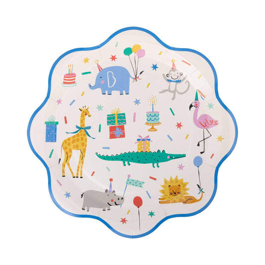 Colourful animal-themed scalloped paper plate featuring lions, elephants, giraffes, and balloons, perfect for kids’ parties in Toronto. Sold at our shop and fast shipping Canada and US.