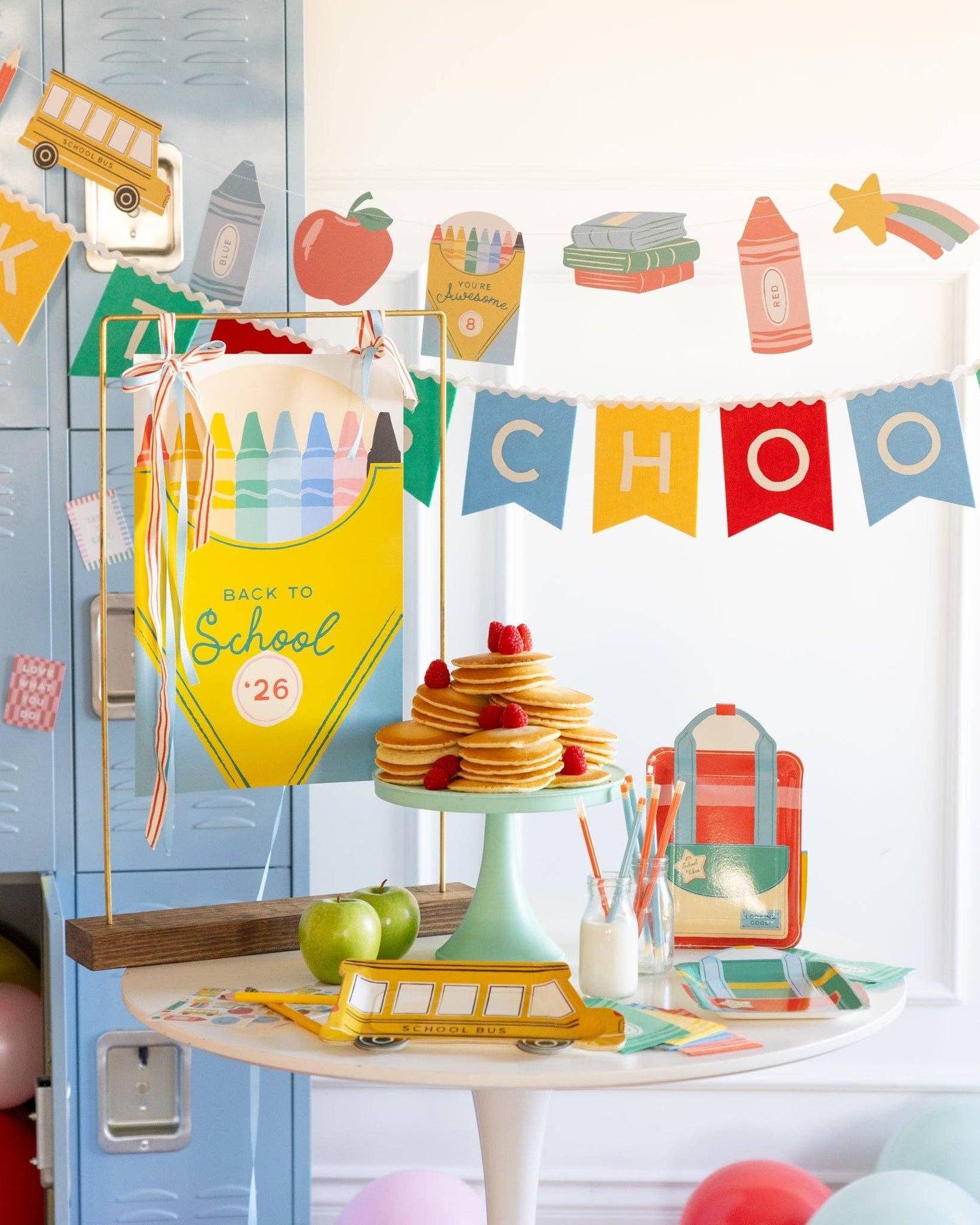 Back-to-school themed decor with colorful elements and a blue locker.