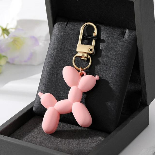 mini balloon dog keychain in a pretty pink colour