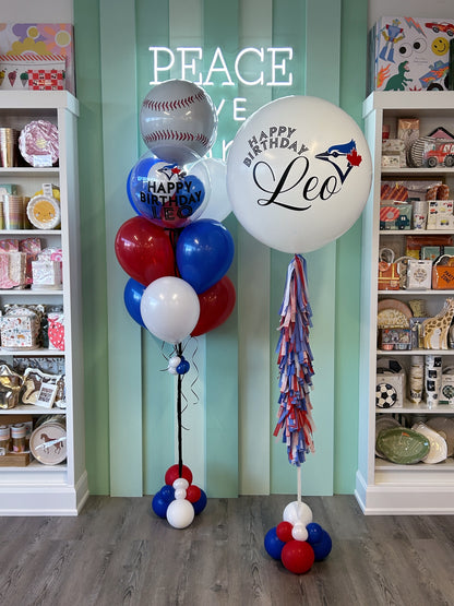 Toronto Baseball balloons featuring a personalized jumbo white balloon with baseball-inspired design and red, white, and blue accents, available in Toronto