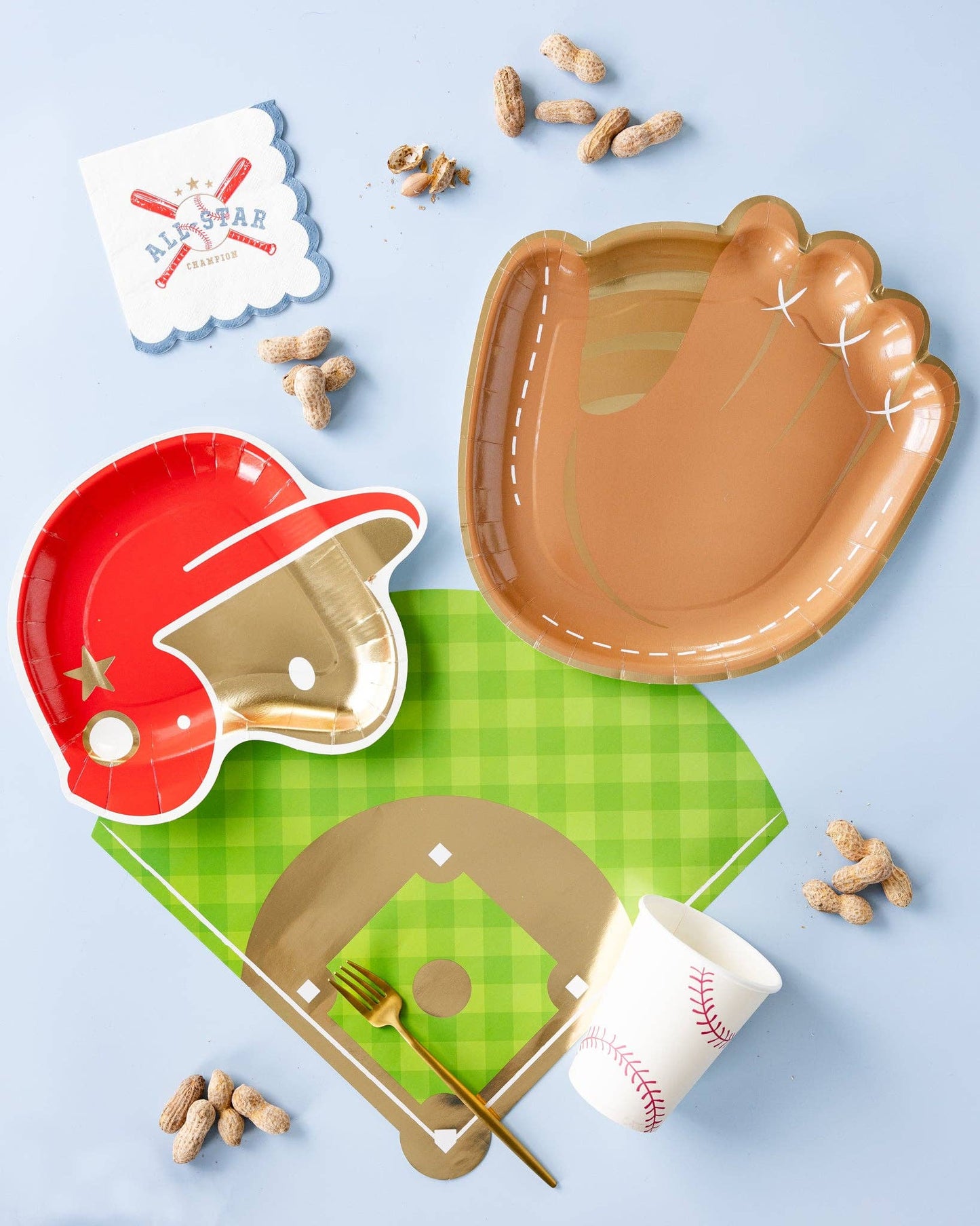 Baseball party setup with diamond placemat, themed plates and tableware, available in Toronto and shipping across Canada