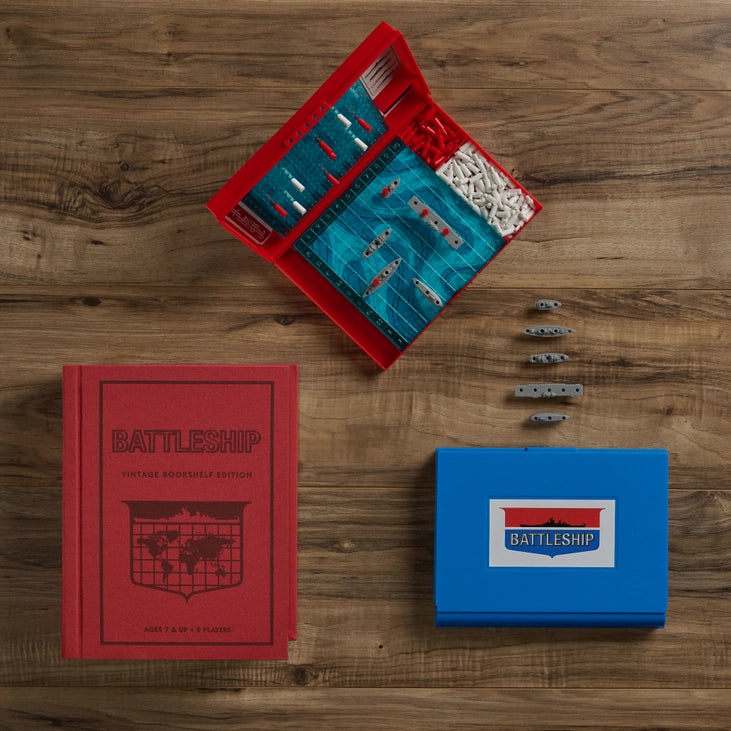 Battleship game pieces with red hit pegs, white miss pegs, and plastic ships, available in Toronto and shipping across Canada.