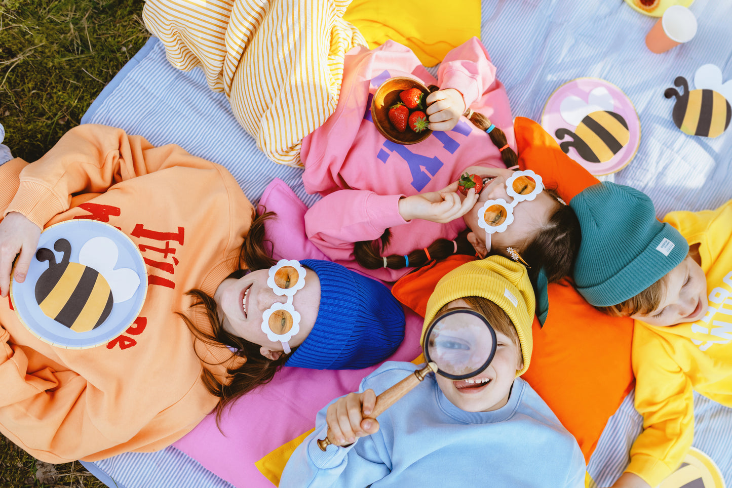 bee shaped napkins with kids having a picnic.