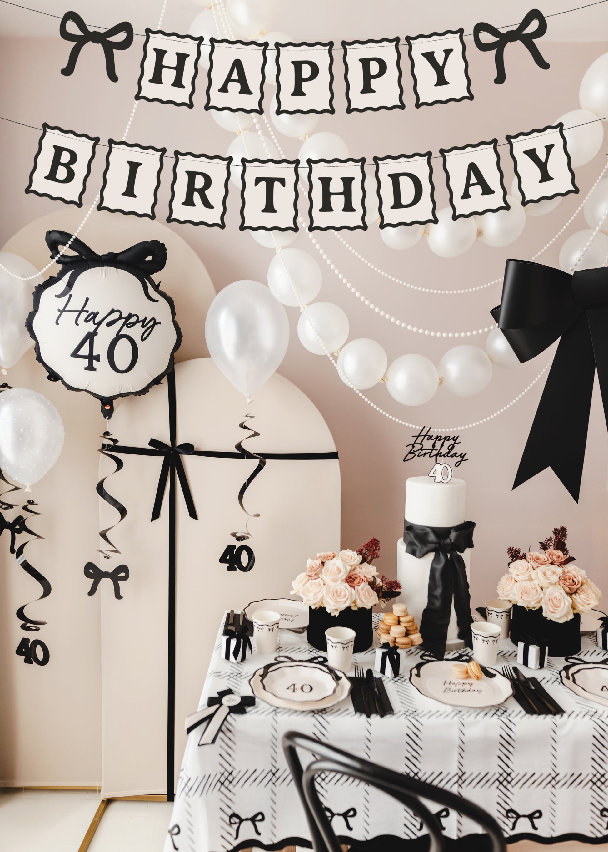 Black and cream Happy Birthday banner styled for an elegant monochrome birthday party available at our Toronto party shop