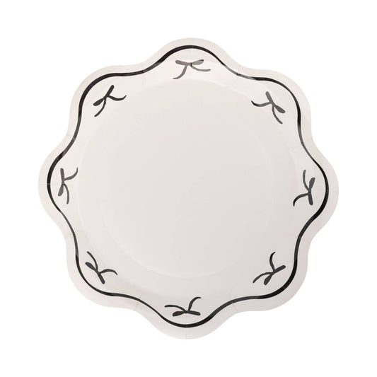White scalloped paper plate with elegant black bow border, perfect for bridal showers and parties fast shipping in Toronto.
