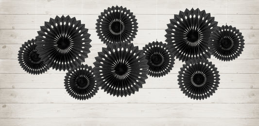 Black rosette backdrop decor arranged on a wall available at our Toronto party shop