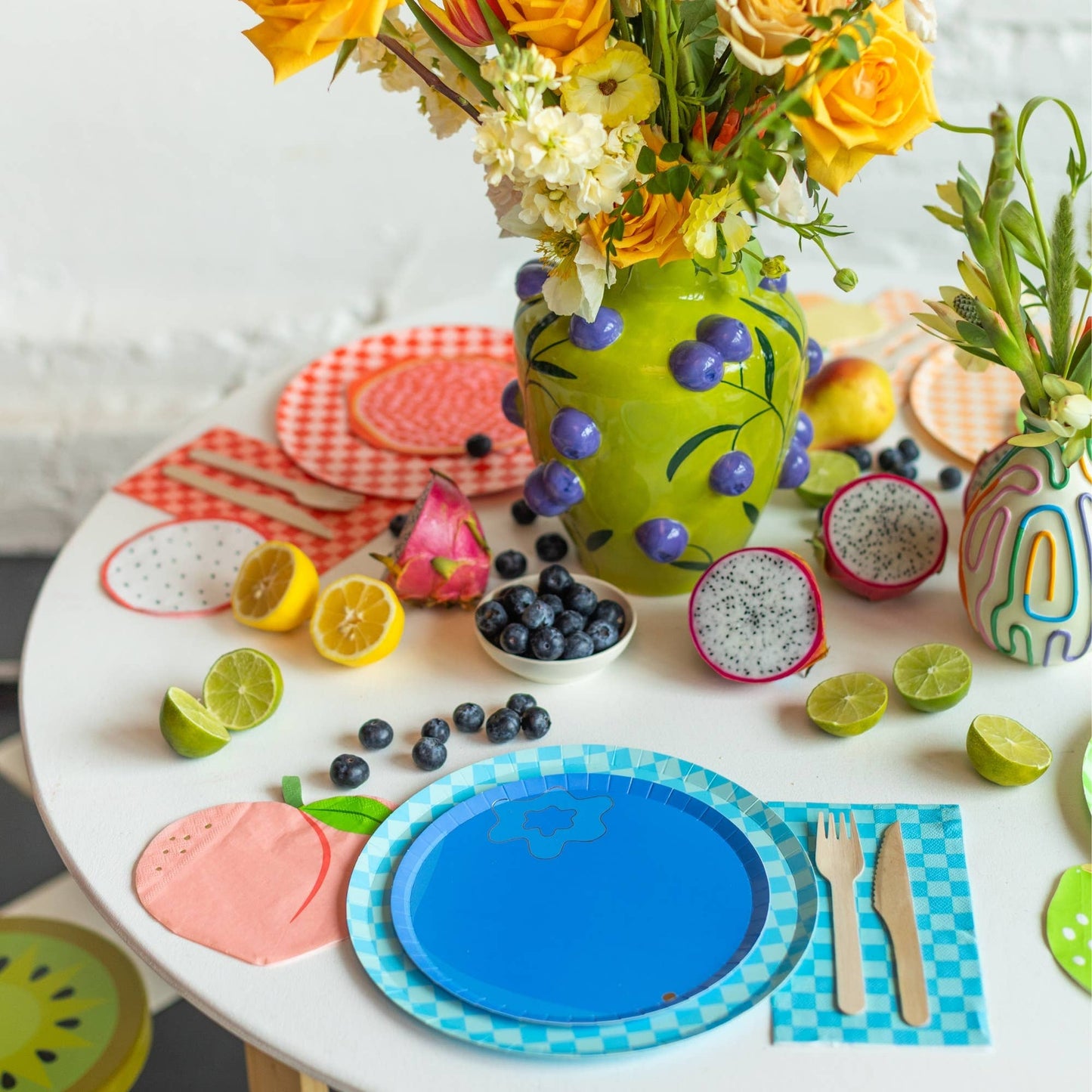 Blueberry dessert plates styled in a Toronto party table arrangement.
