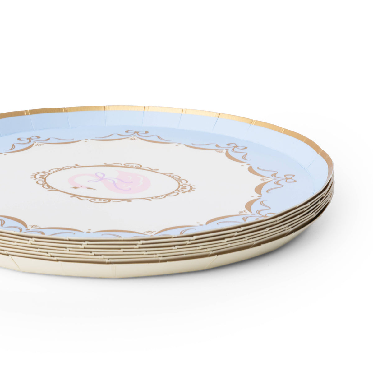 Close-up of blue princess paper plates with swan design, bow details and gold foil trim