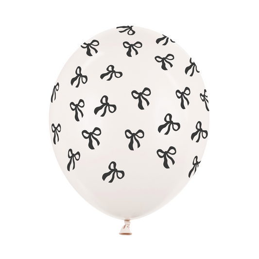 Elegant pastel off-white bow print balloon, perfect party decor available in Toronto and ships across Canada.