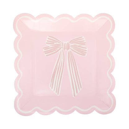 Pink scalloped dessert plate featuring a delicate bow illustration, sold in Toronto at Confetti My Party