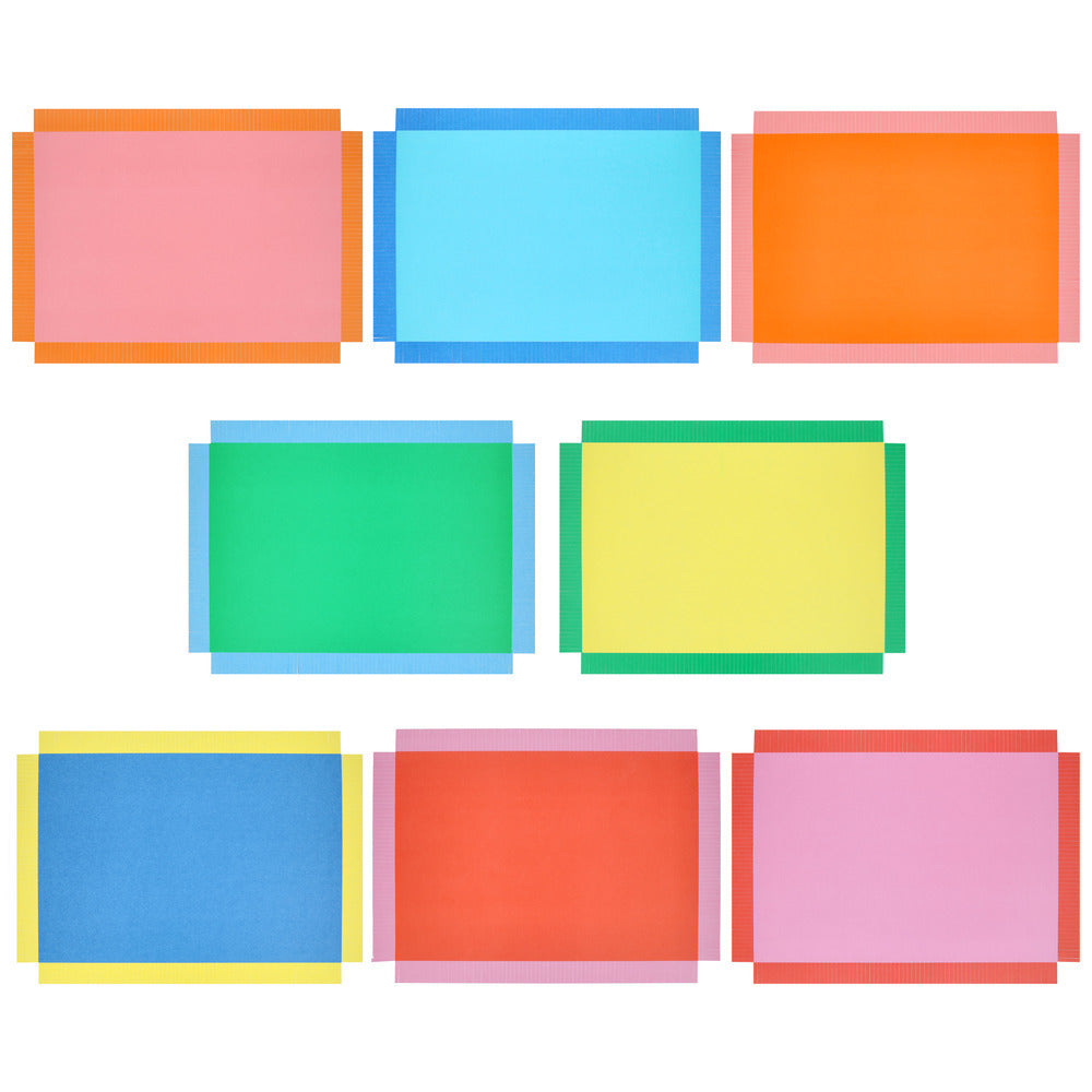 Meri Meri bright fringe paper placemats in layered rainbow colours available at our Toronto party shop