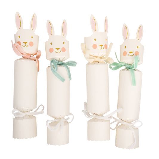 Bunny Easter crackers with pastel ribbon bows and illustrated bunny faces, sold in Toronto at Confetti My Party