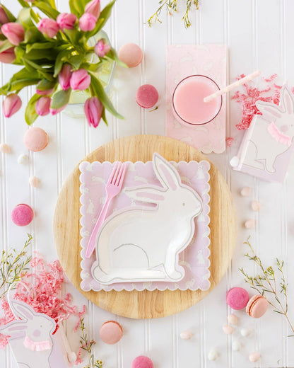 Easter table styled with bunny pattern dinner napkins and pastel decor, Confetti My Party Toronto
