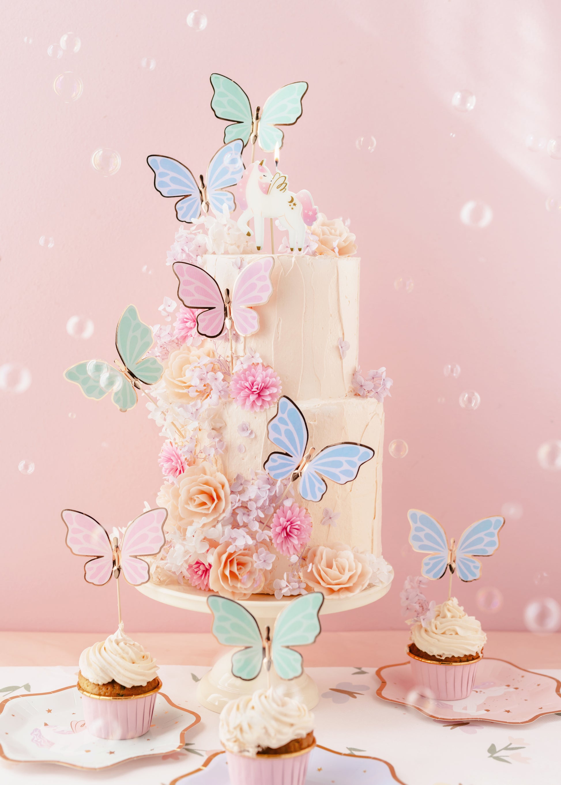 butterfly cake toppers displayed on a cake 