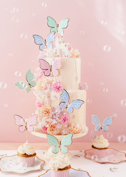 butterfly cake toppers displayed on a cake 