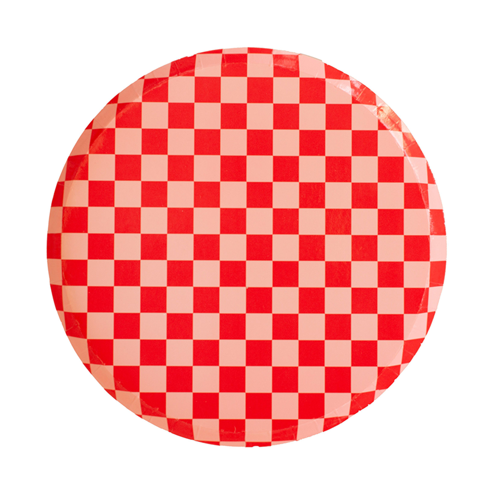 Red checkerboard dinner plate with pink and red square pattern, part of the modern party collection shipping across Canada.