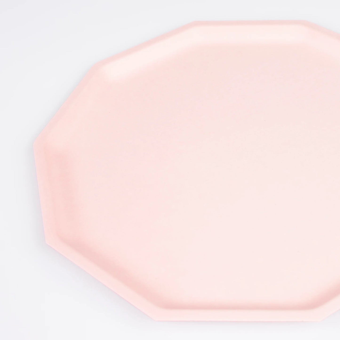 closeup of pink decagon dinner plate