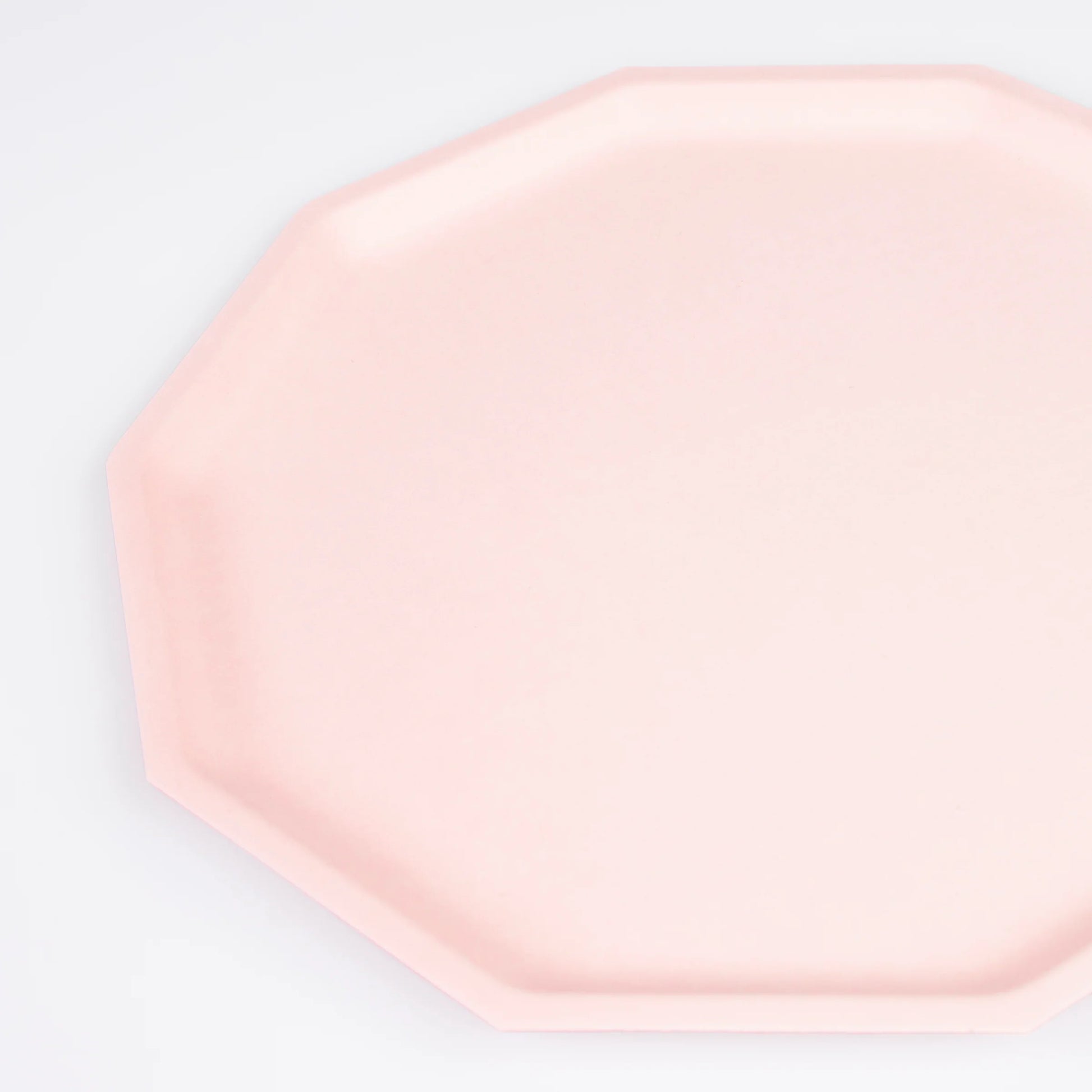 closeup of pink decagon dinner plate