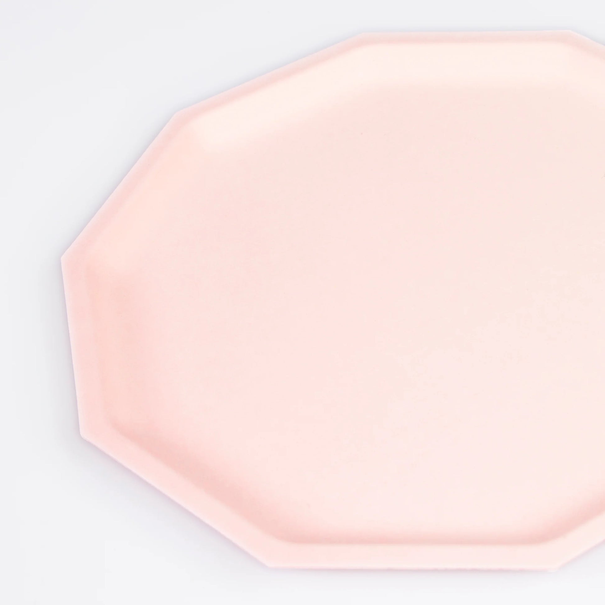 closeup of pink decagon side plate