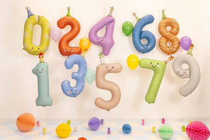 Pastel birthday number foil balloons styled together for a colourful birthday party display available at our Toronto party shop