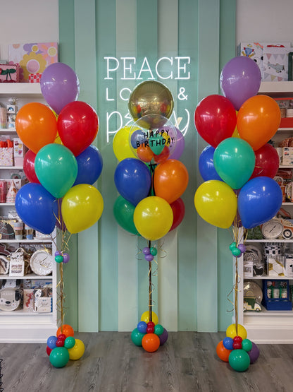Colourful birthday balloon bouquets with bright latex balloons and a personalized bubble balloon, designed by ConfettiMyParty in Toronto.