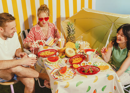 Striped paper party plates with a retro summer design available in Toronto and shipping across Canada