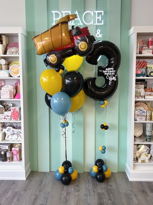 Construction Truck Mini Kid Pop balloon display with dump truck foil and construction-inspired balloon colours, available for pickup in Toronto or GTA delivery